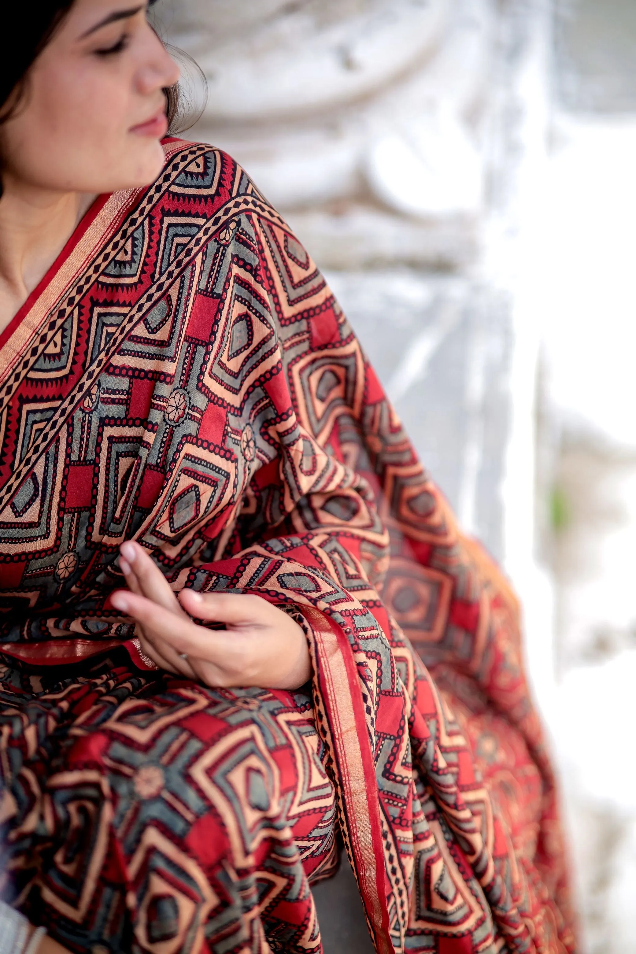 A trsyt with Ajrakh -Jharokha -Triangle Black and Red Chanderi ajrakh saree