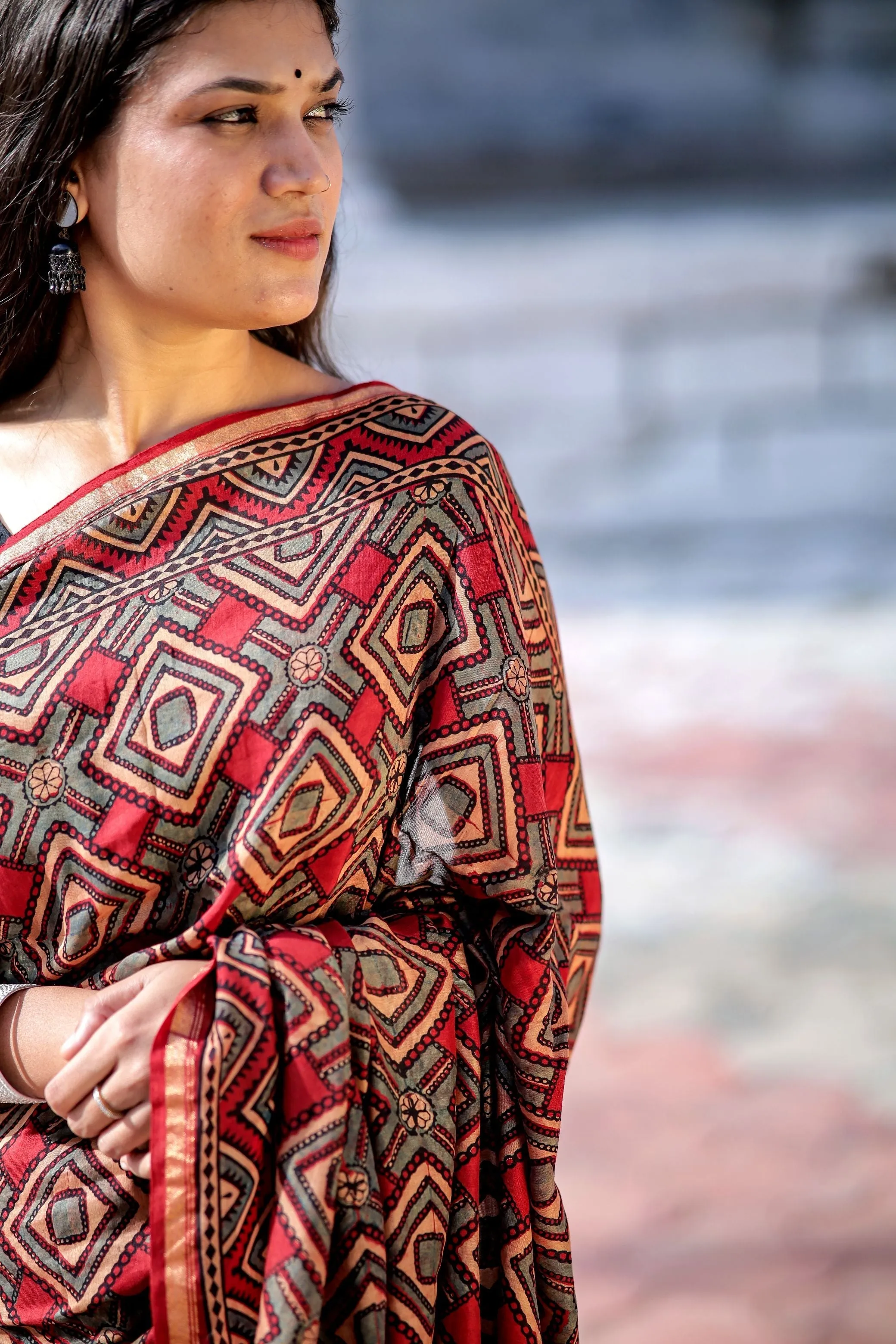 A trsyt with Ajrakh -Jharokha -Triangle Black and Red Chanderi ajrakh saree