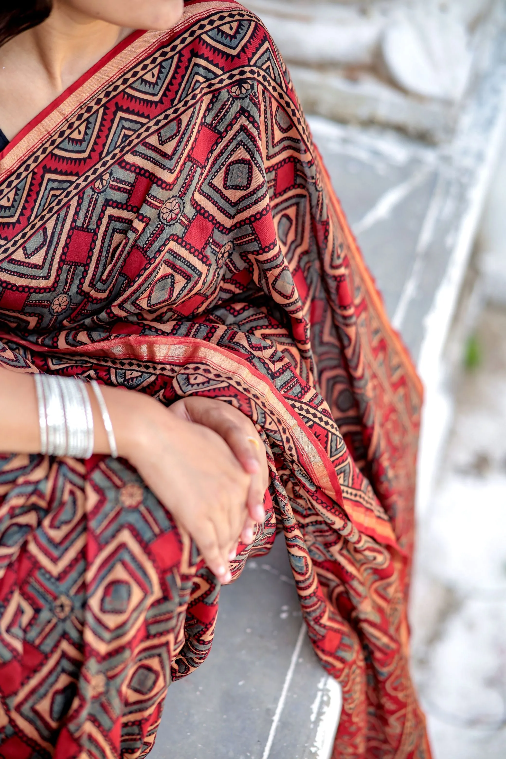 A trsyt with Ajrakh -Jharokha -Triangle Black and Red Chanderi ajrakh saree