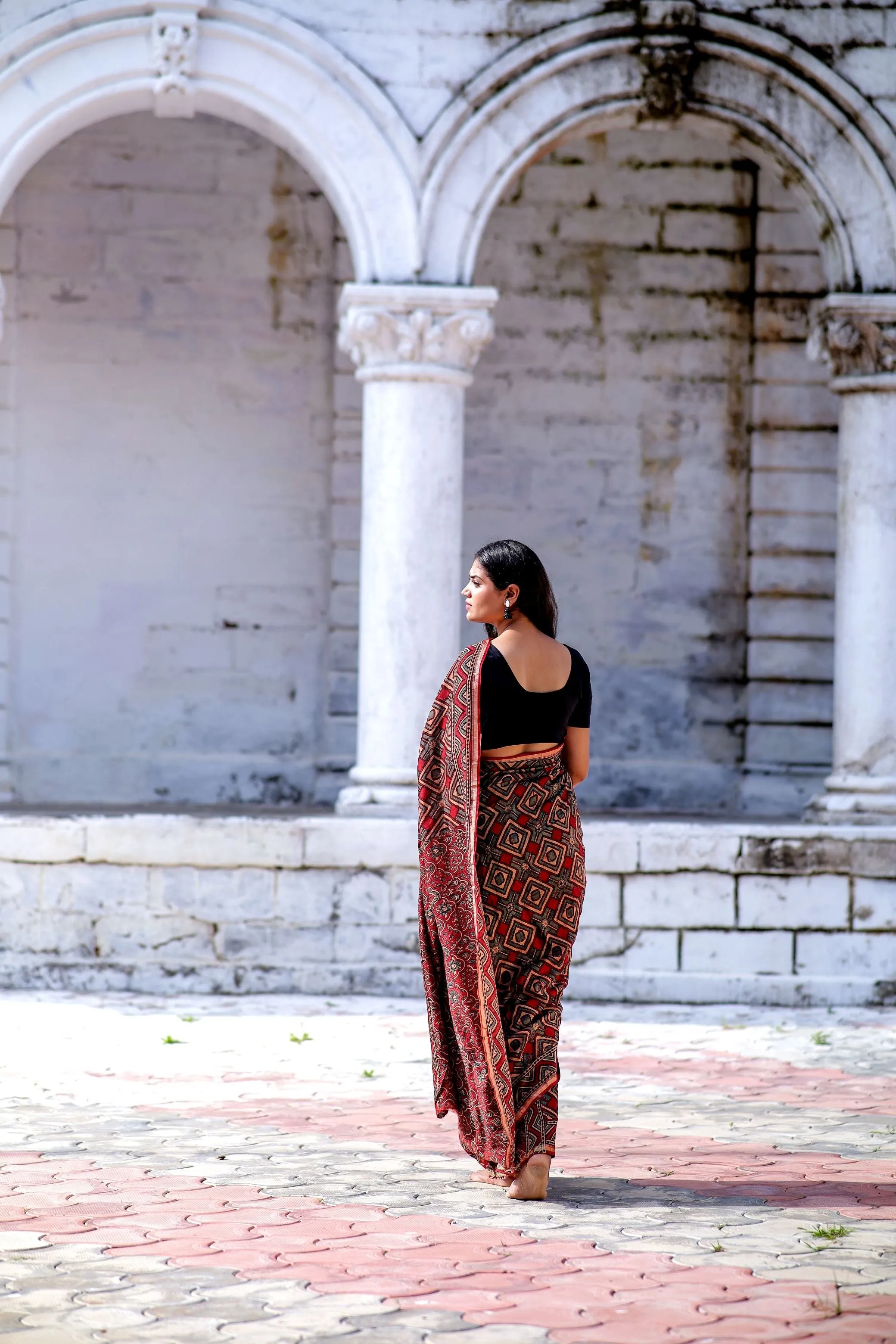 A trsyt with Ajrakh -Jharokha -Triangle Black and Red Chanderi ajrakh saree