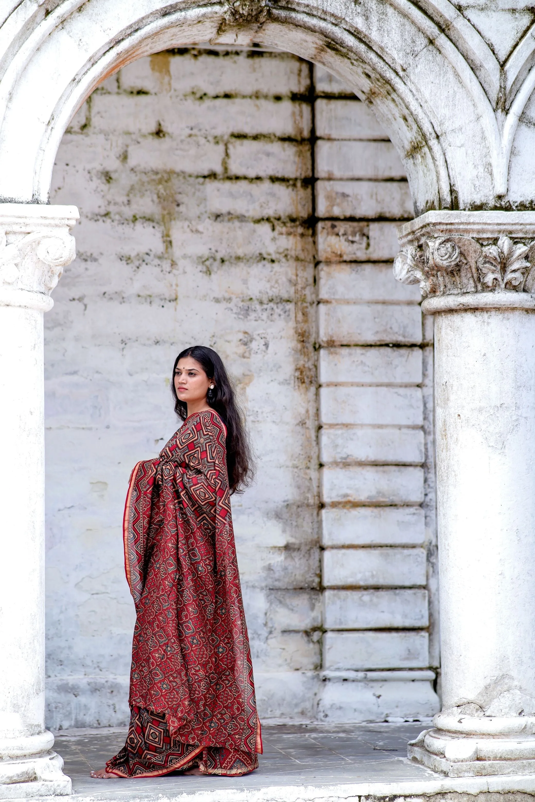 A trsyt with Ajrakh -Jharokha -Triangle Black and Red Chanderi ajrakh saree