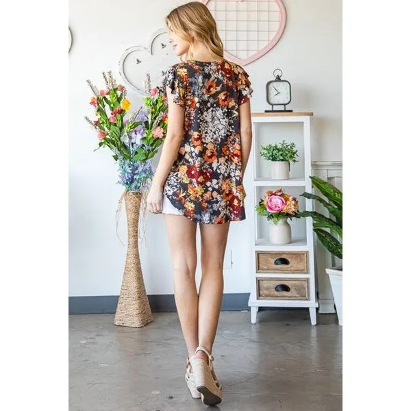 Heimish Full Size Ruffled Floral Round Neck Cap Sleeve Blouse