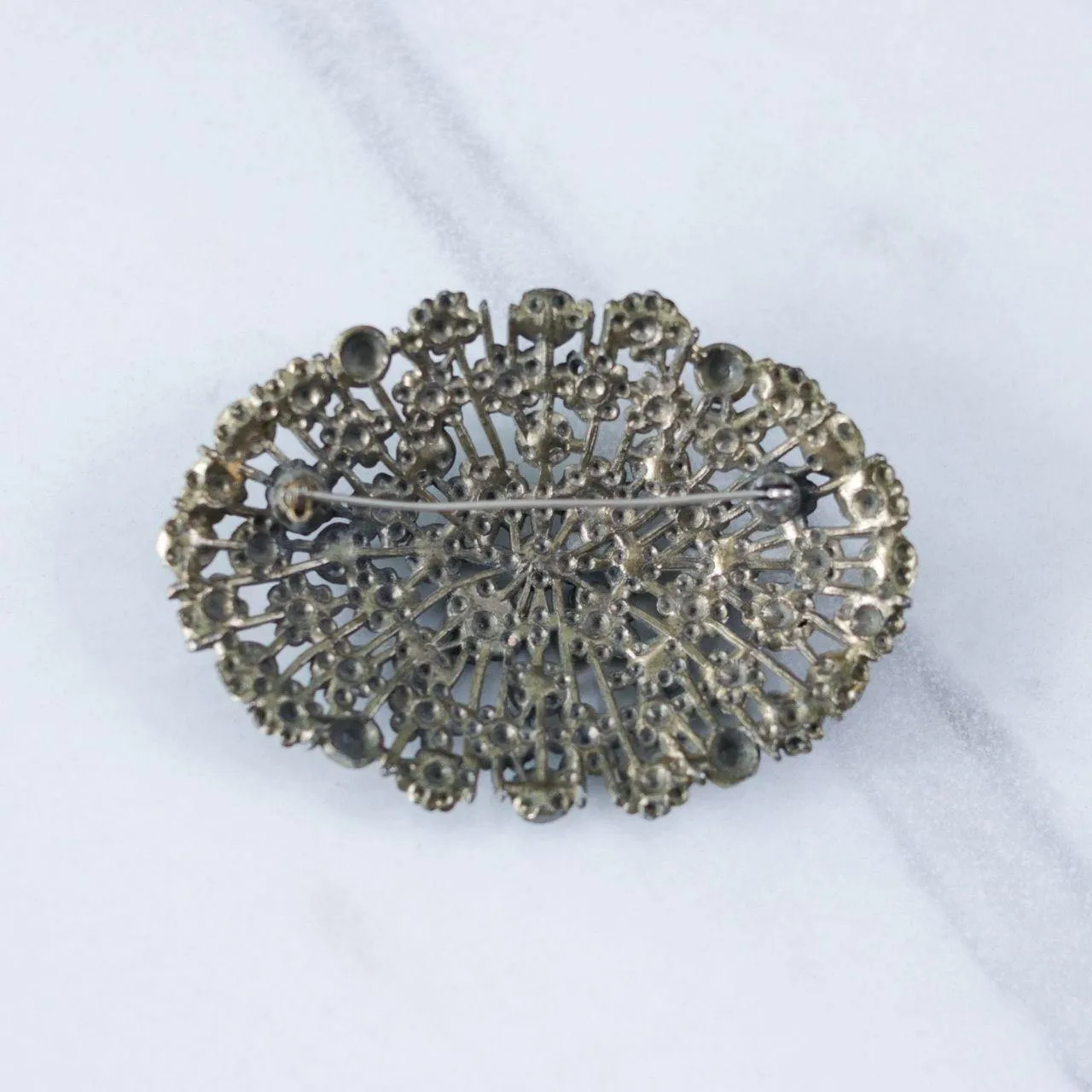 Vintage Large Green Brass Pot Metal Brooch with Embossed Floral Design and Green Rhinestone Accents